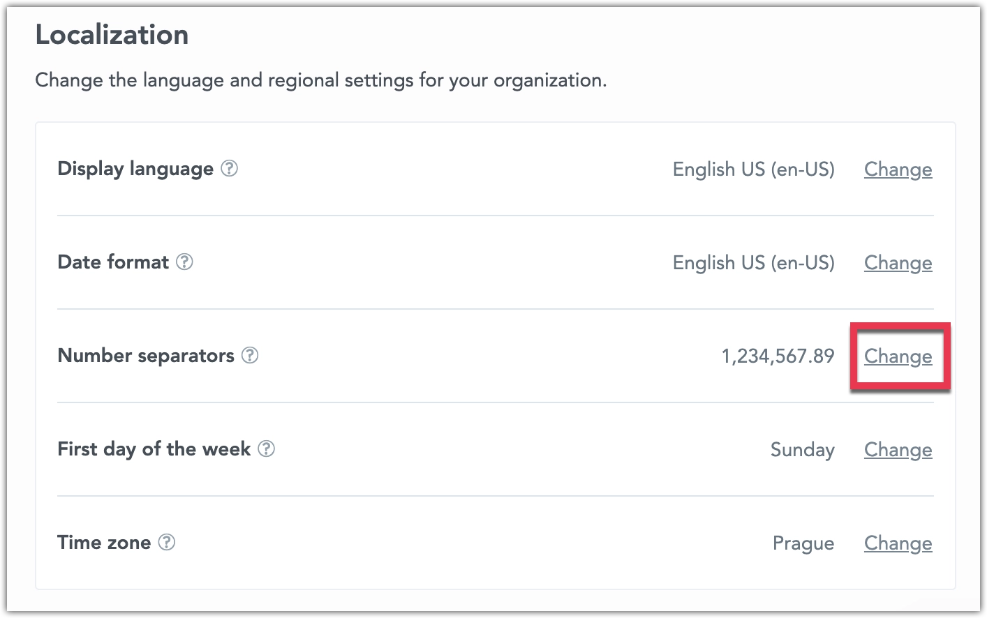 Settings tab showing the Number separators row with a current setting displayed as comma and period. The Change button is at the right side of the row.